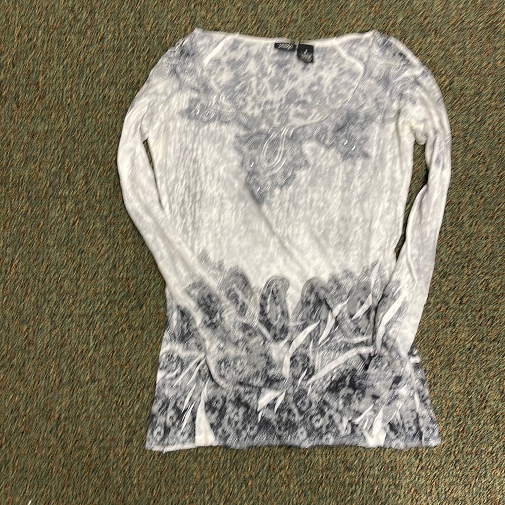 Small woman top. Long sleeve.  Has some bling on it too!